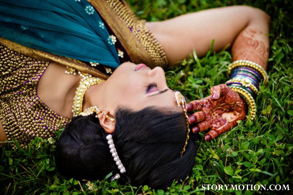 Indian bride with bridal mehndi and hair and makeup ideas.