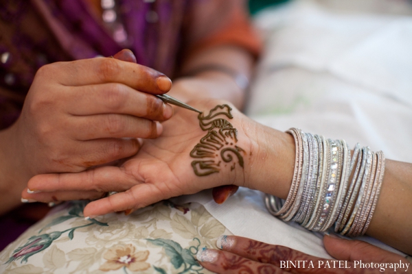 Bridal mehndi received by henna artist.