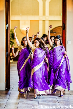 indian bridesmaid in purple saris.