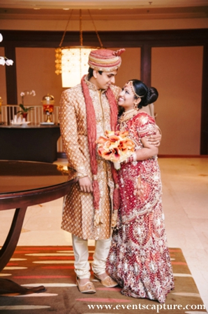 Indian bride and groom in traditional indian wedding wear.