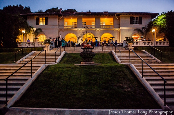 Indian wedding venue has outdoor seating for guests.