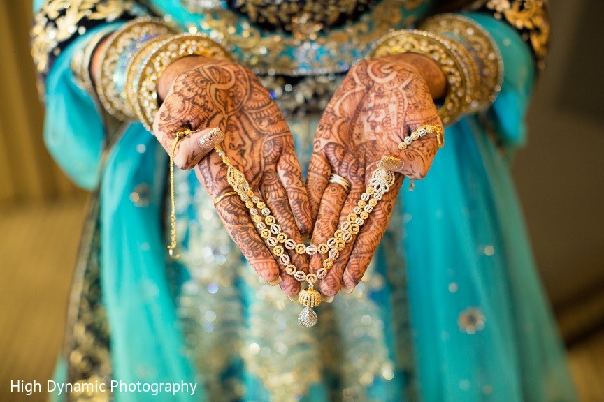 Beautiful woman dressed up as Indian tradition with henna mehndi design on  her both hands to celebrate big festival of Karwa Chauth, Karwa Chauth  celebrations by Indian woman for her husband 17096726