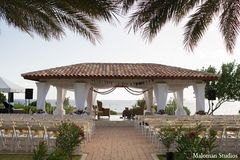 An Indian couple wed in a Hindu ceremony at their destination wedding.