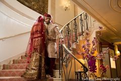 This Indian bride and groom celebrate their marriage with a traditional wedding ceremony in a gorgeous venue.