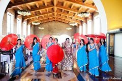 An Indian bride poses with her bridal party.