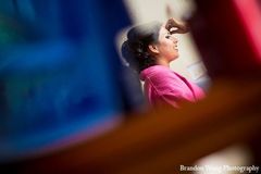 A Indian bride gets ready for her wedding day.