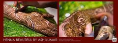 A expert mehndi artist showcases henna designs on hands and feet.