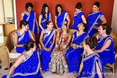 Before their Indian wedding ceremony, this bride and groom pose for some first-look portraits and then unite with their wedding party for more photo ops!