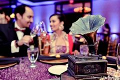 An Indian bride and groom celebrate at their timeless reception.