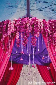 A Punjabi couple opt for shades of pink and purple for their wedding.