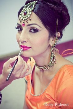 This Indian bride prepares for her fabulous Sikh ceremony by getting dolled up like a true princess!