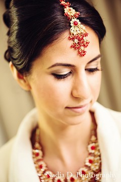 This Indian bride is enjoying a pamper sesh as she gets her hair and makeup styled by the pros!