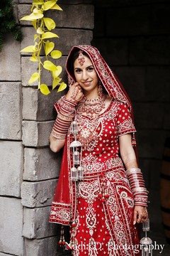 Before their beautiful Indian wedding ceremony, this bride and groom pose for some lovely outdoor portraits.