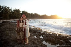 This Indian bride and groom have tied the knot and now they're ready to pose for some beautiful portraits with their wedding party!