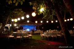 At this beautiful Indian wedding reception, the bride and groom opt for a cool blue theme and a gorgeous white cake!