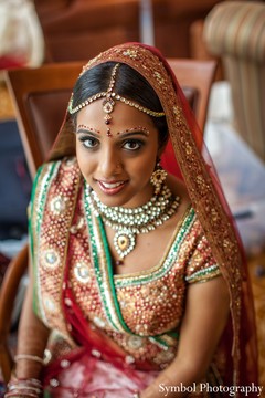 A bride glams up for her wedding festivities.