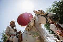 A groom leads the baraat to his Indian fusion wedding.