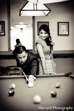 An Indian bride and groom take wedding portraits before they tie the knot.