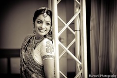 An Indian bride and groom take wedding portraits before they tie the knot.