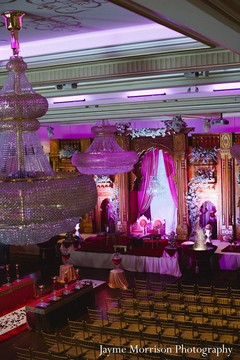 Before this Indian wedding ceremony begins, we get a sneak peek into the venue that is filled with pink and gold decor!