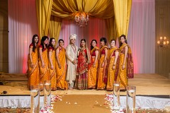 An Indian bridal party with a bride and groom.