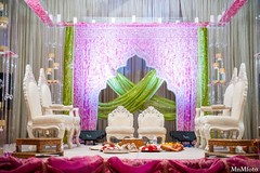 A bride and groom wed in a traditional Hindu wedding ceremony.