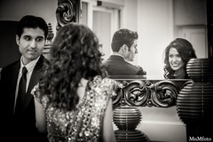 An Indian bride and groom take portraits before their wedding reception.