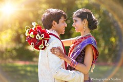 Before their Indian wedding ceremony, this bride and groom take a few moments to pose for lovely portraits!