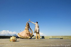 After tying the knot, this lovely bride and groom take a moment to pose for beautiful portraits!