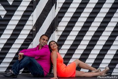 A future bride and groom take some outdoor engagement portraits.