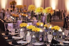 This Indian wedding reception is filled with beautiful floral and decor.