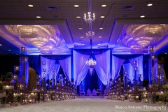 This Indian wedding ceremony features beautiful floral and decor!