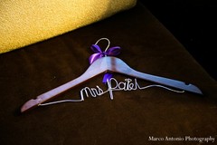 This Indian bride has an adorable custom hanger for her reception lengha!