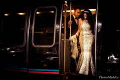 This Indian bride arrives at her reception in a gorgeous silver lengha.