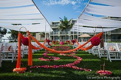 Sensational floral and decor adds beautiful color to this Indian wedding ceremony.