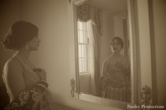 This Indian bride gets ready for her wedding reception.