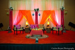 For this brilliant sangeet, the venue is bright and the traditional decor is fabulous!