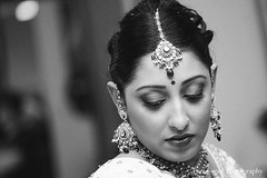 This Indian bride prepares for her wedding day with beautiful hair and makeup.