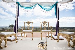 This Indian fusion ceremony features a beautiful outdoor setting with a gorgeous mandap.