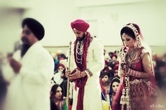 This Indian bride and groom celebrate their wedding with a traditional ceremony.