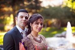 After their beautiful wedding ceremony, this bride and groom pose for lovely portraits.