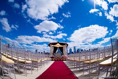 This beautiful Indian wedding ceremony is a traditional event held outdoors.