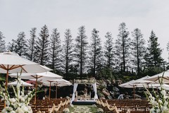 This outdoor Indian wedding ceremony is a beautiful affair with lovely decor.