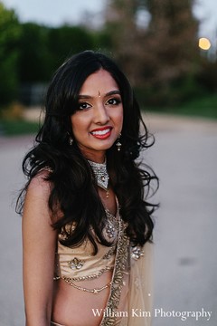 This Indian bride celebrates at her fabulous reception with lovely portraits.