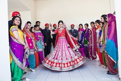 This Sikh ceremony features a beautiful bride posing for portraits.