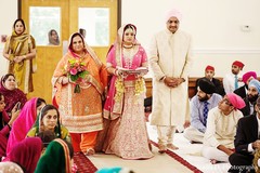 An Indian bride and groom wed in a Sikh ceremony.