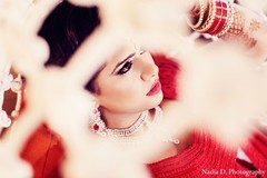 An Indian bride takes reception portraits before her big night.