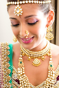 This Indian bride is styled to perfection with beautiful hair and makeup.