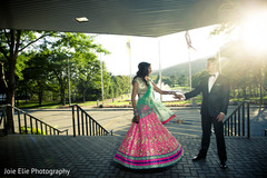 An Indian bride and groom pose for portraits before their wedding reception.