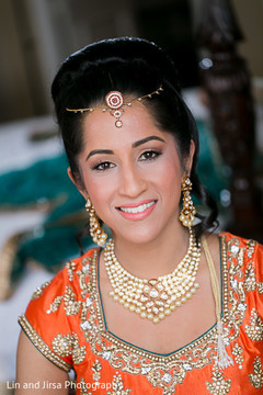 This beautiful Indian bride prepares for her fabulous wedding and poses for lovely portraits.